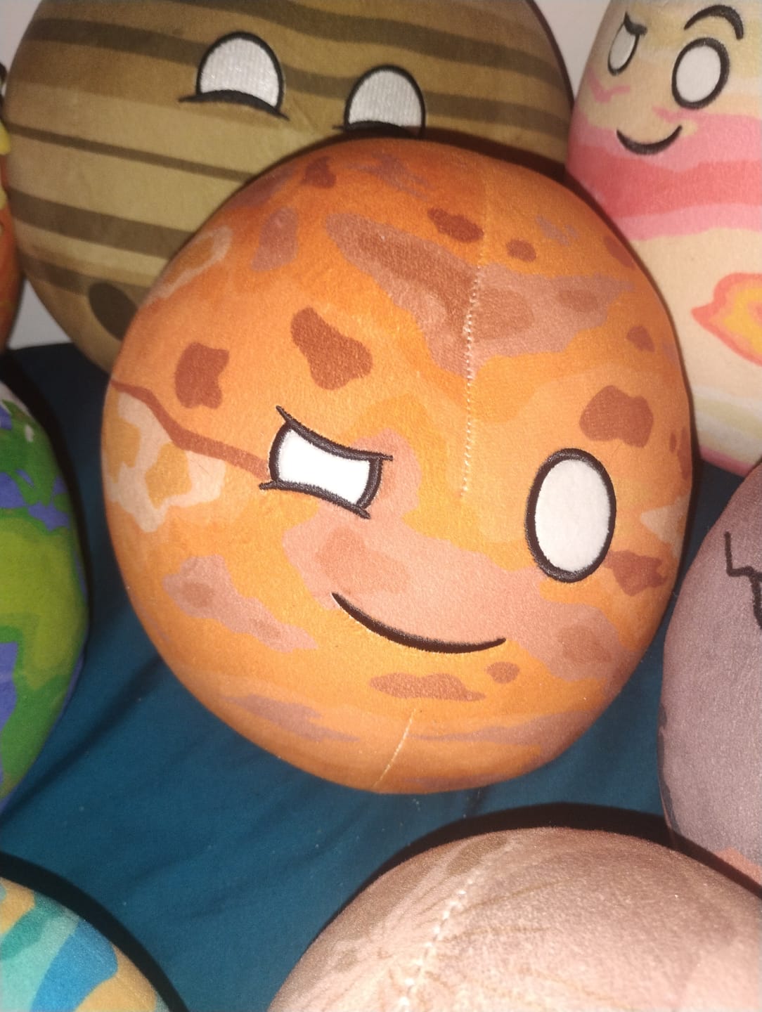 Customer photo review of The SolarBalls Mars Plush