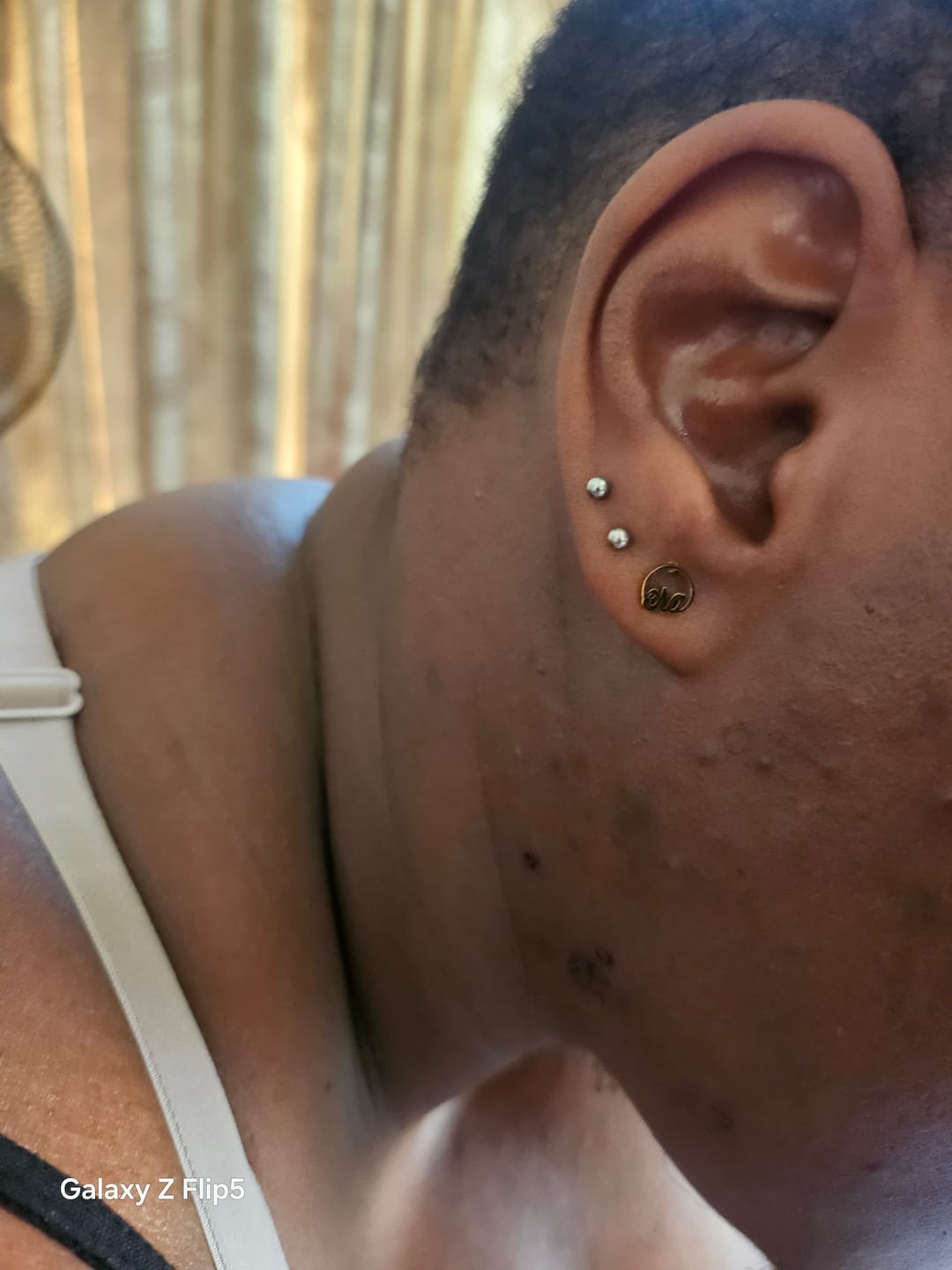 Customer photo review of Mini Era Logo Studs