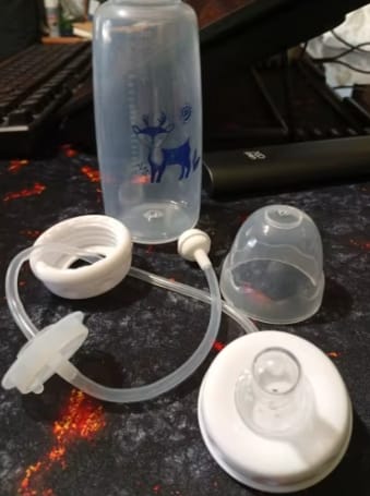 Customer photo review of Biberón Manos Libres Anti-Cólicos 240ML