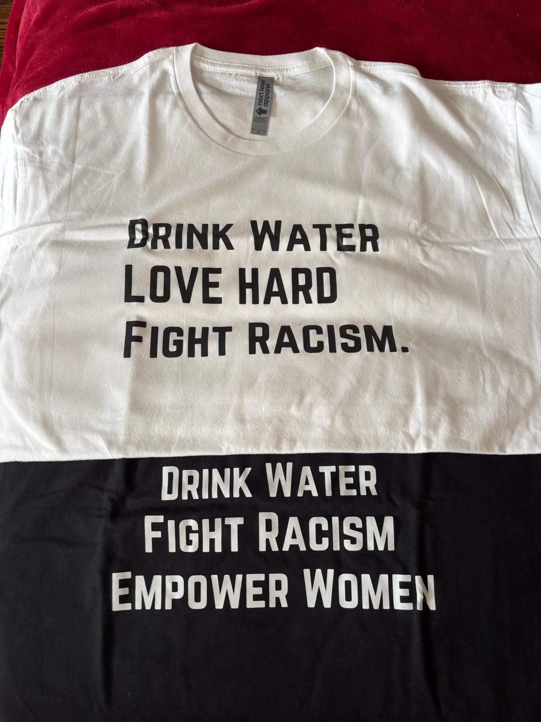 Customer photo review of Drink Water Fight Racism Unisex T-shirt