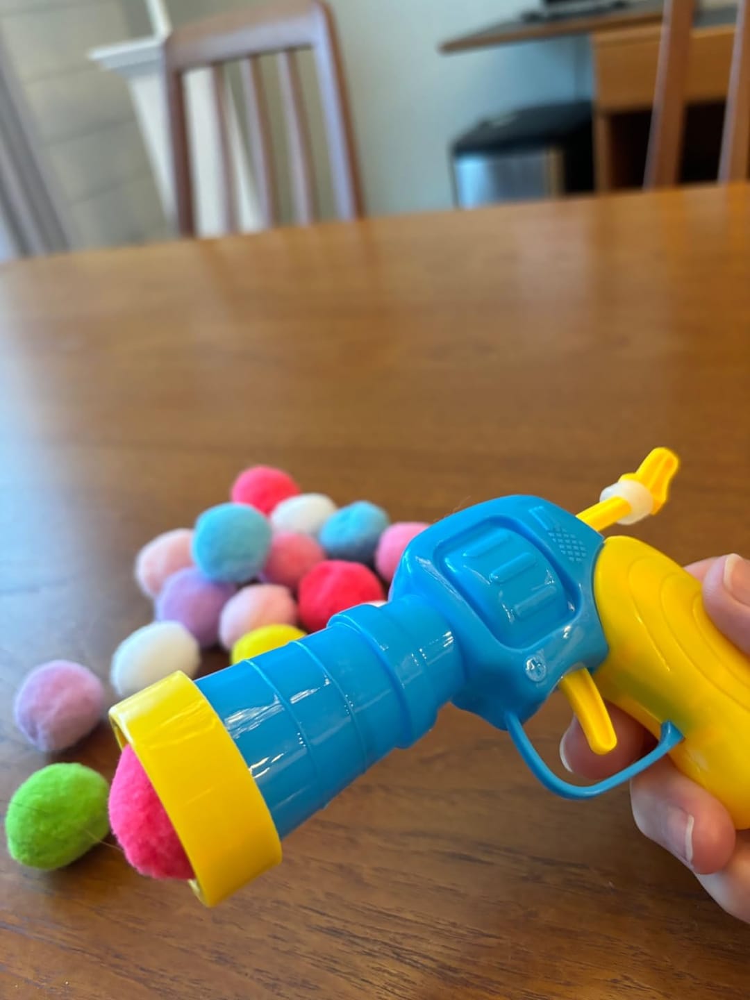 Customer photo review of Calming Puff Launcher (100 x soft fuzzy puff balls)