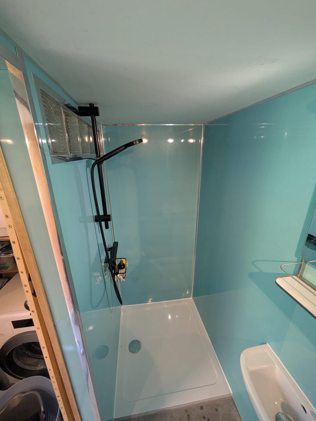 Customer photo review of 10mm Aqua Blue Shimmer Gloss Shower Panel 1M x 2.4M