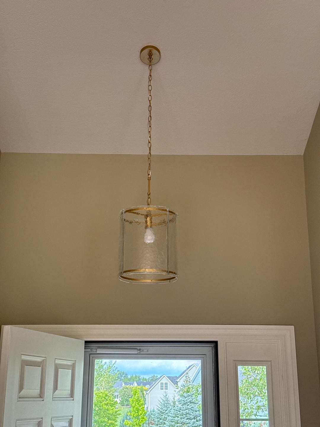 Customer photo review of Farmhouse Clear Textured Glass Cylinder Cage Pendant