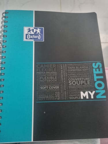 Customer's MyNOTES OXFORD spirale notebook with a black and blue soft cover.