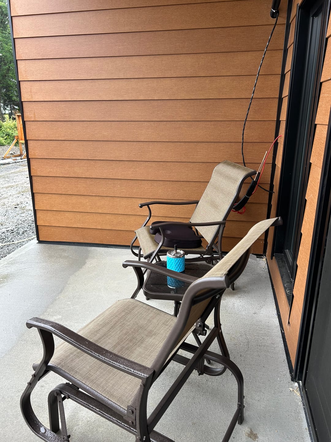 Customer photo review of 3-Piece Gliding Rocking Chair & Bistro Table Set, Brown Outdoor Furniture