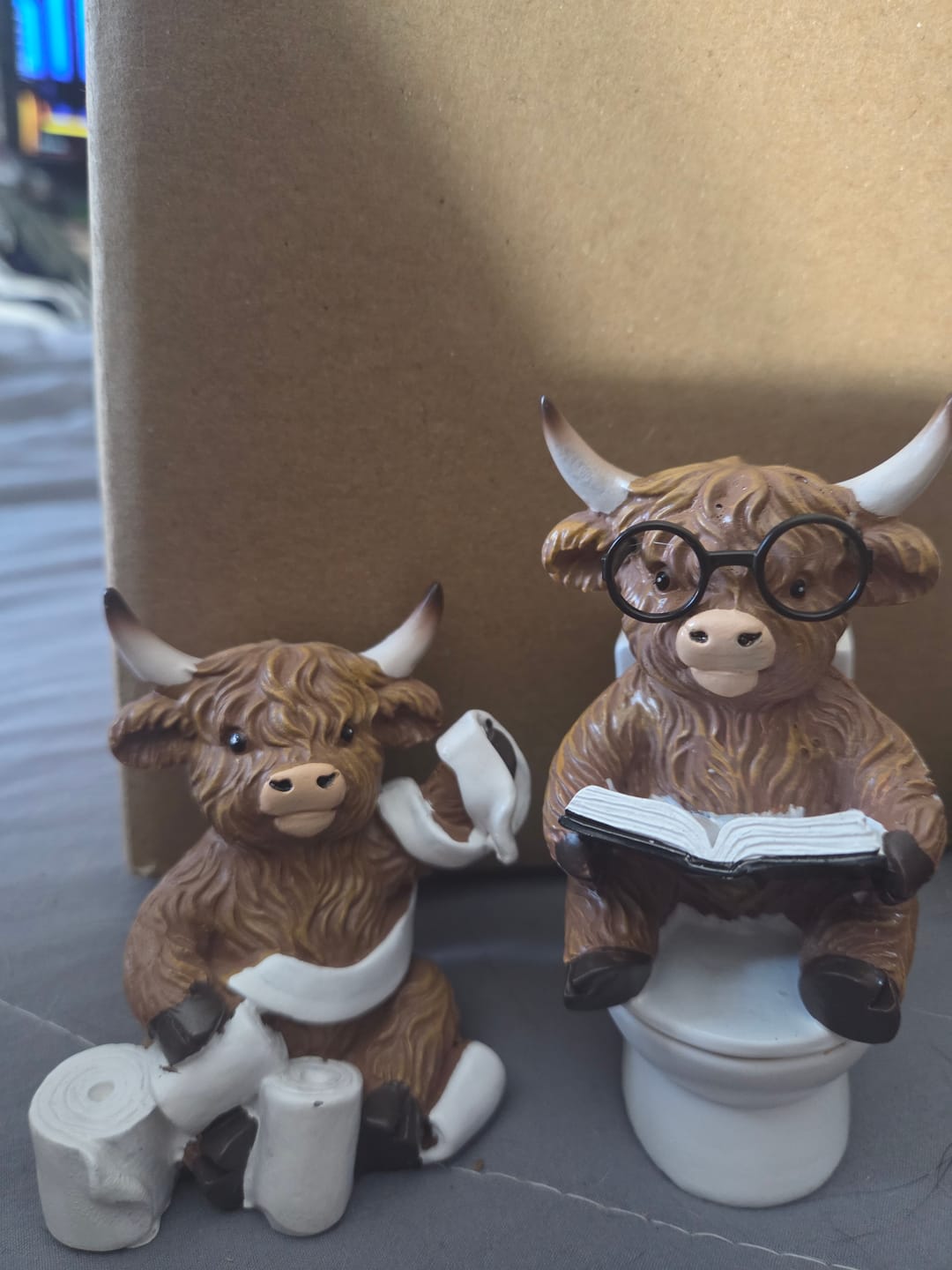 Customer photo review of Highland Cow Powder Room Resin Sitters (Three Styles)