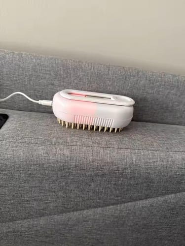 Customer photo review of 3-in-1 Steamy Pet Brush and Massage Comb – Spray Grooming Tool for Dogs and Cats