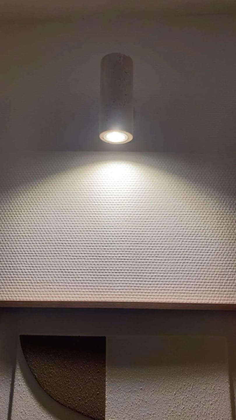 Customer photo review of Wabi-Sabi Travertine Wall Lamp