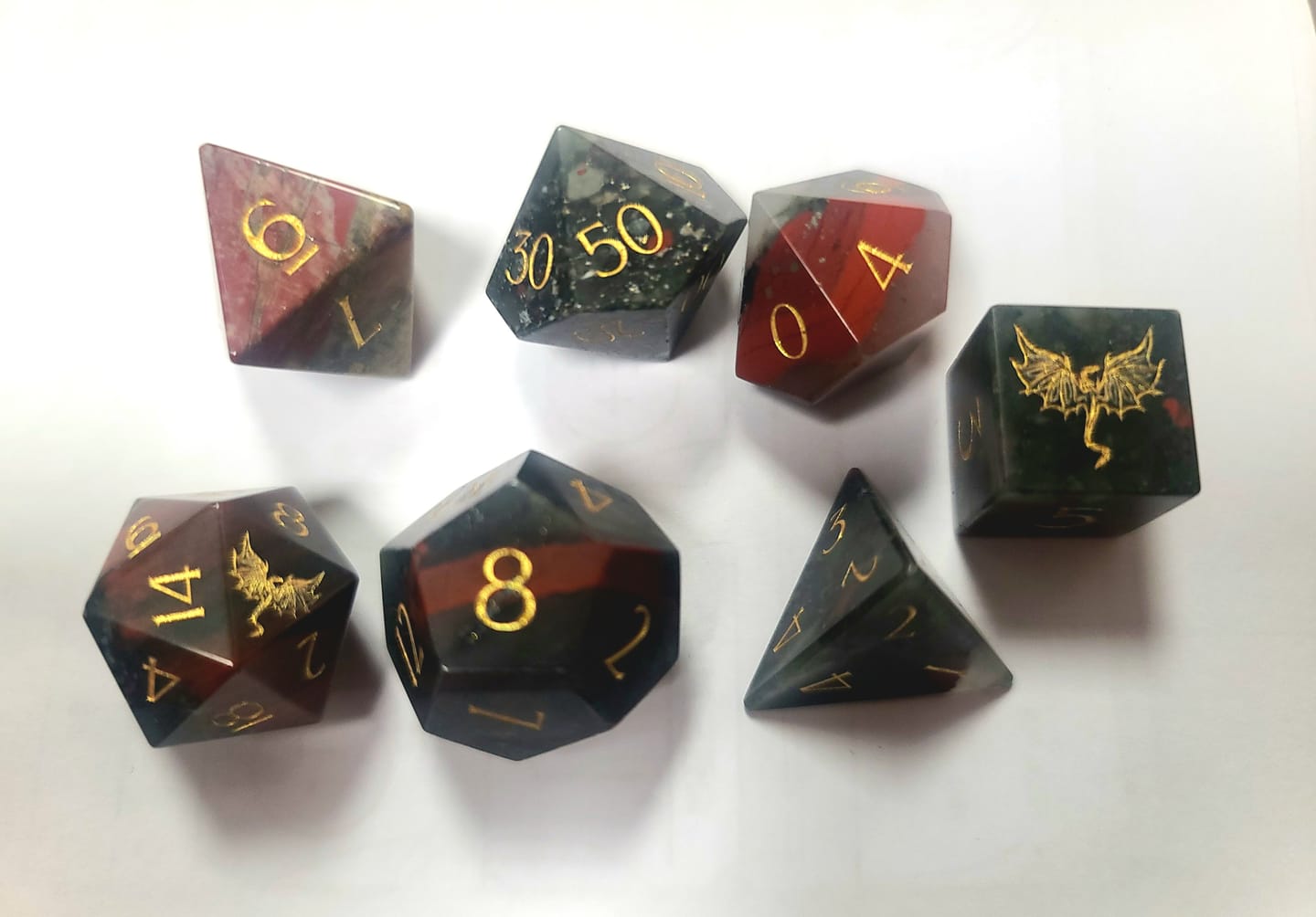 Customer photo review of URWizards D&D Bloodstone Engraved Dice Set Dragon Style