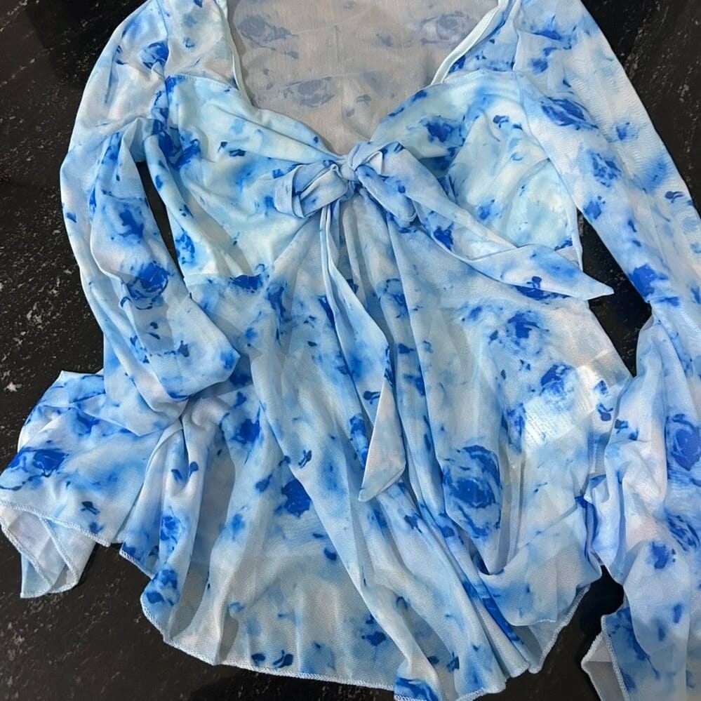 Customer photo review of Ninonine "Elowen" | Floral Mesh Bow-Front Peplum Top