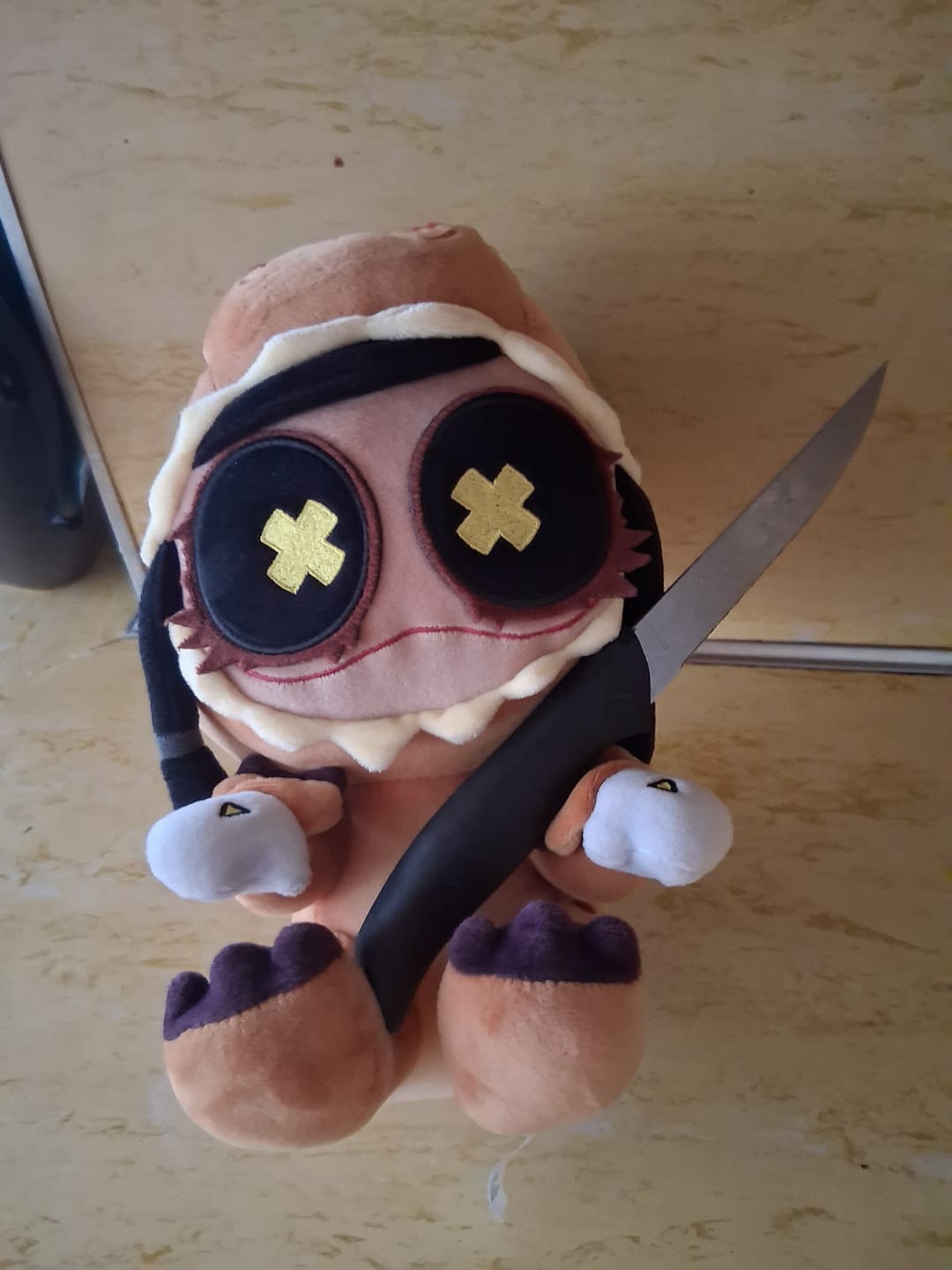 Customer photo review of Cyn T-Rex Plush