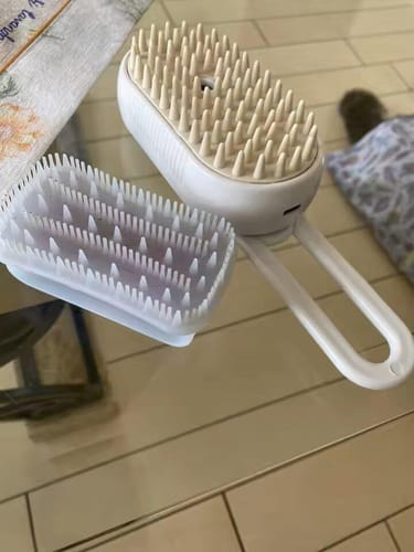 Customer photo review of 3-in-1 Steamy Pet Brush and Massage Comb – Spray Grooming Tool for Dogs and Cats