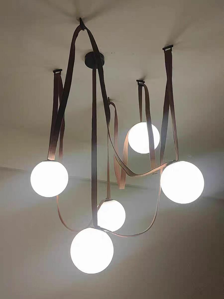 Customer photo review of Multiple Belt Art Pendant Light, Leather or Canvas Glass Globe Chandelier