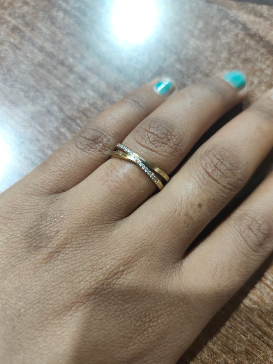Customer photo review of Cross-Over Stones Lined Twist Ring