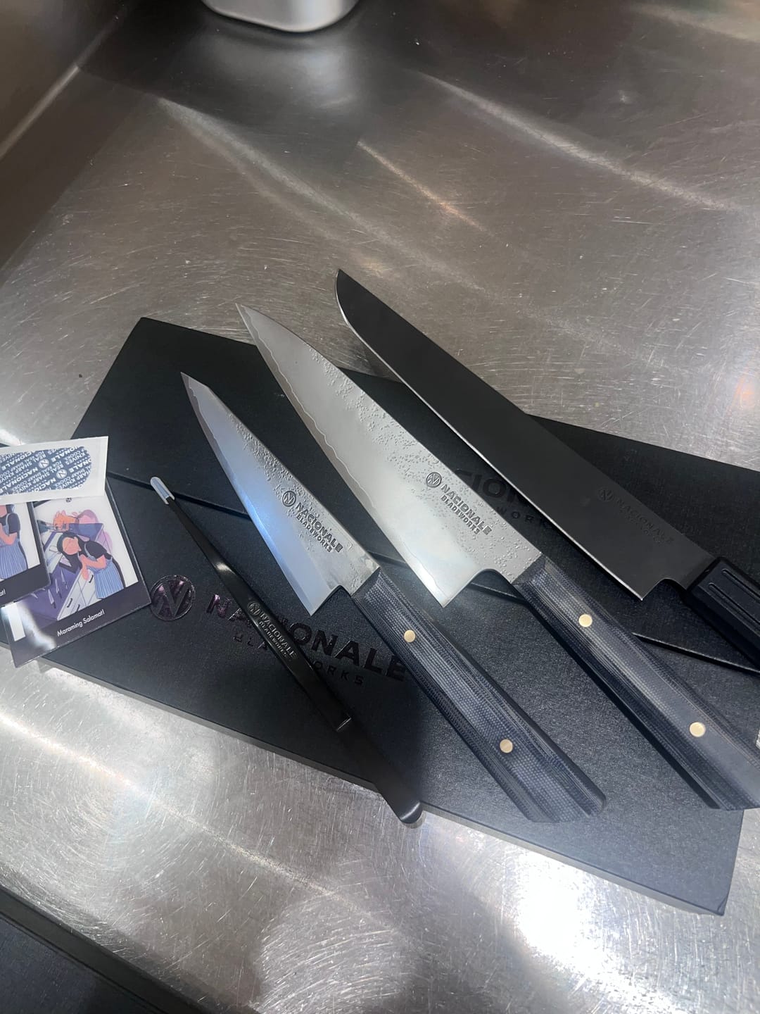 Customer photo review of 215mm Gyuto. Nashiji San Mai 440C. Full Tang Denim Micarta