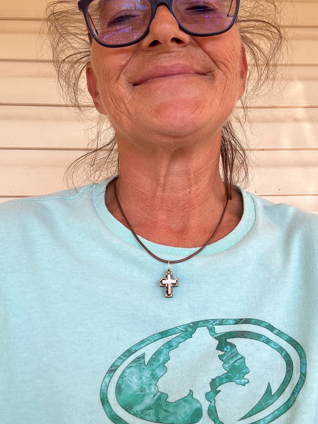 Customer photo review of Holy Land Olive Wood Carved Cross with Mother of Pearl