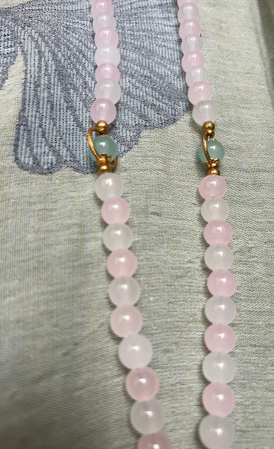 Customer photo review of SolaceBeads Artistic Pink & White Beaded Rosary: A Fusion of Colors & Sacred Symbols