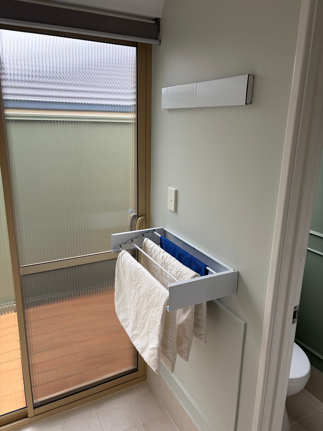 Customer photo review of Wall Mounted Drying Rack - Foldable Indoor and Outdoor Drying Rack