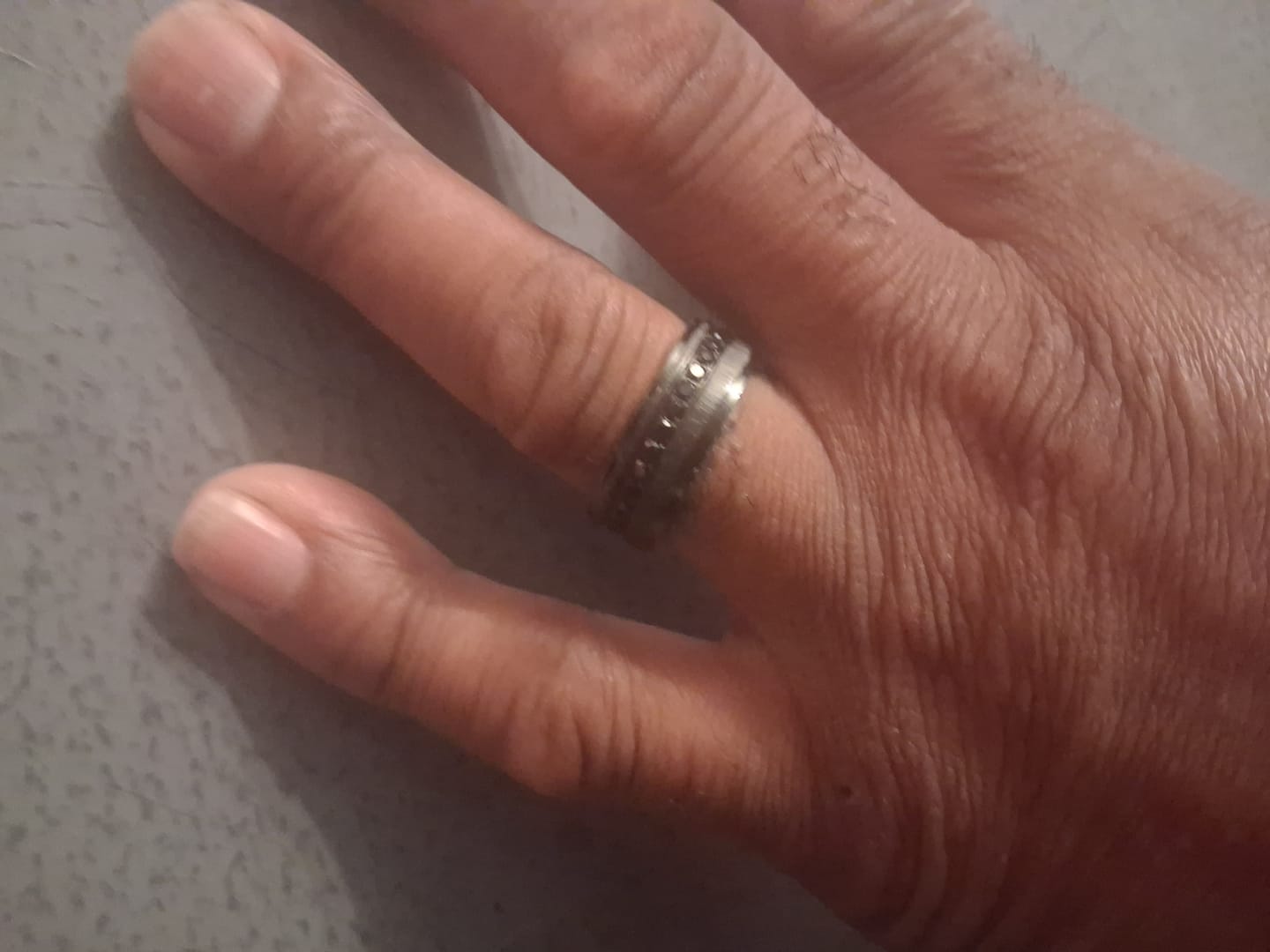 Customer photo review of 8mm Black Titanium Wedding Ring with Round Black Diamonds