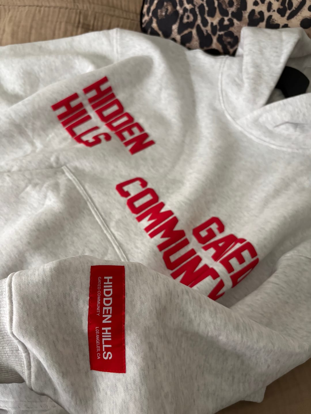 Customer photo review of GATED COMMUNITY HOODIE LIGHT GREY/RED