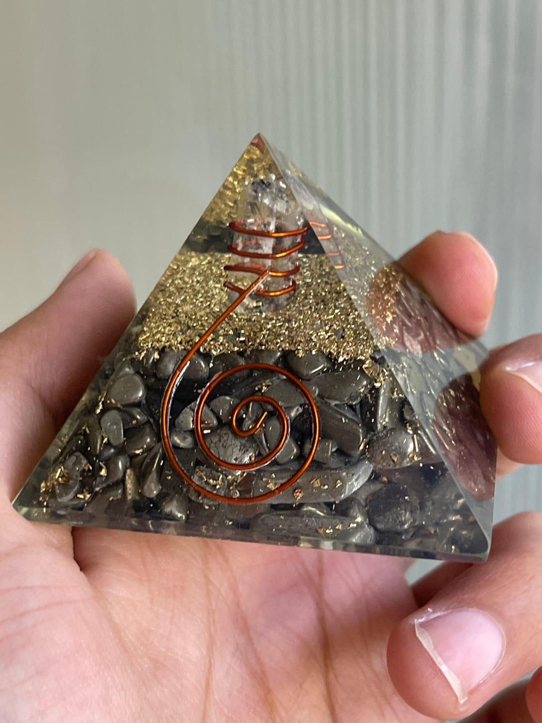 Customer photo review of Pyrite Copper Coil Orgone Pyramid Vastu Remedy for Wealth Magnetism, Money Protection and Prosperity Support for Home, Office and Business Spaces | 6.5 cm | 150 g