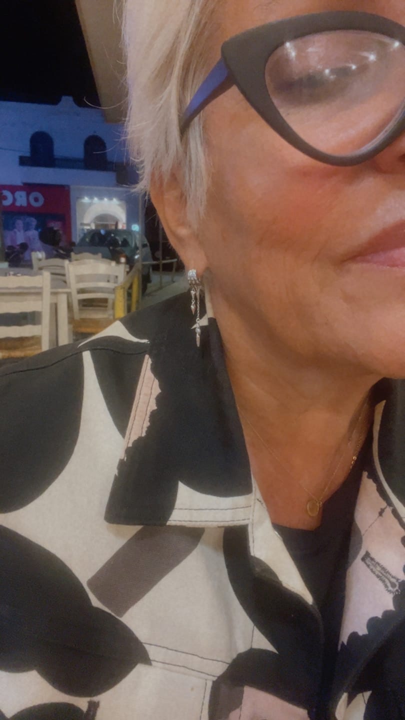 Customer photo review of Paloma Huggie Illusion Earrings