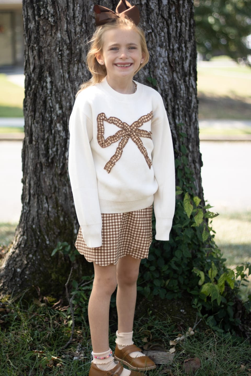 Customer photo review of Cinnamon Gingham Bow Sweater