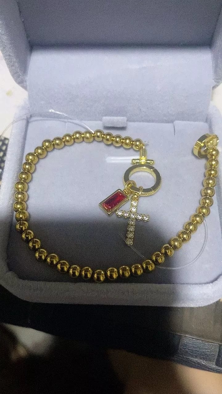 Customer photo review of Birthstone Cross Charm Bracelet