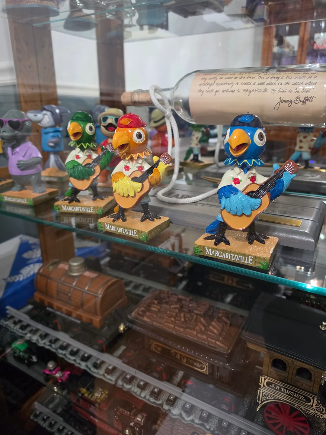 Customer photo review of New Margaritaville Parrot Bobbleheads