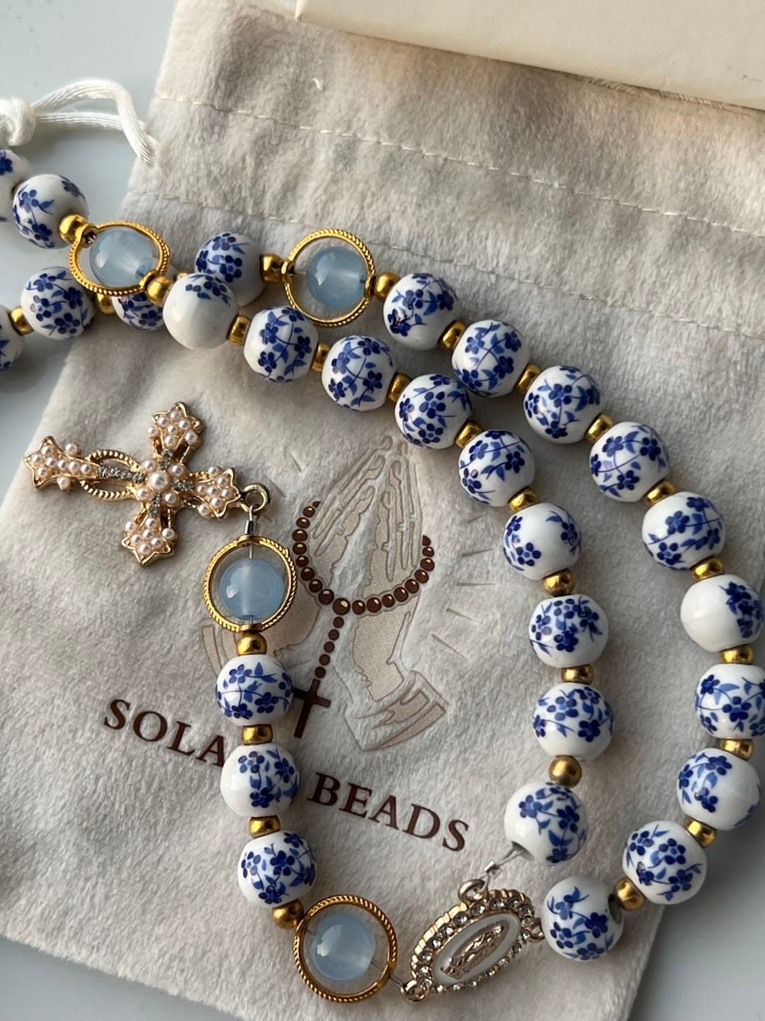 Customer photo review of SolaceBeads Handcrafted Blue Floral Ceramic Rosary: A Tapestry of Grace in life