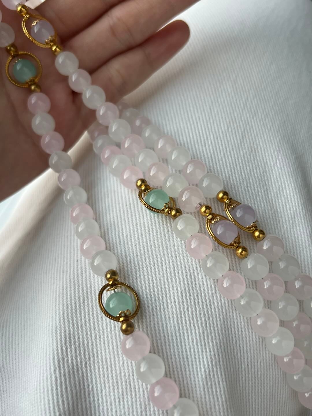 Customer photo review of SolaceBeads Artistic Pink & White Beaded Rosary: A Fusion of Colors & Sacred Symbols