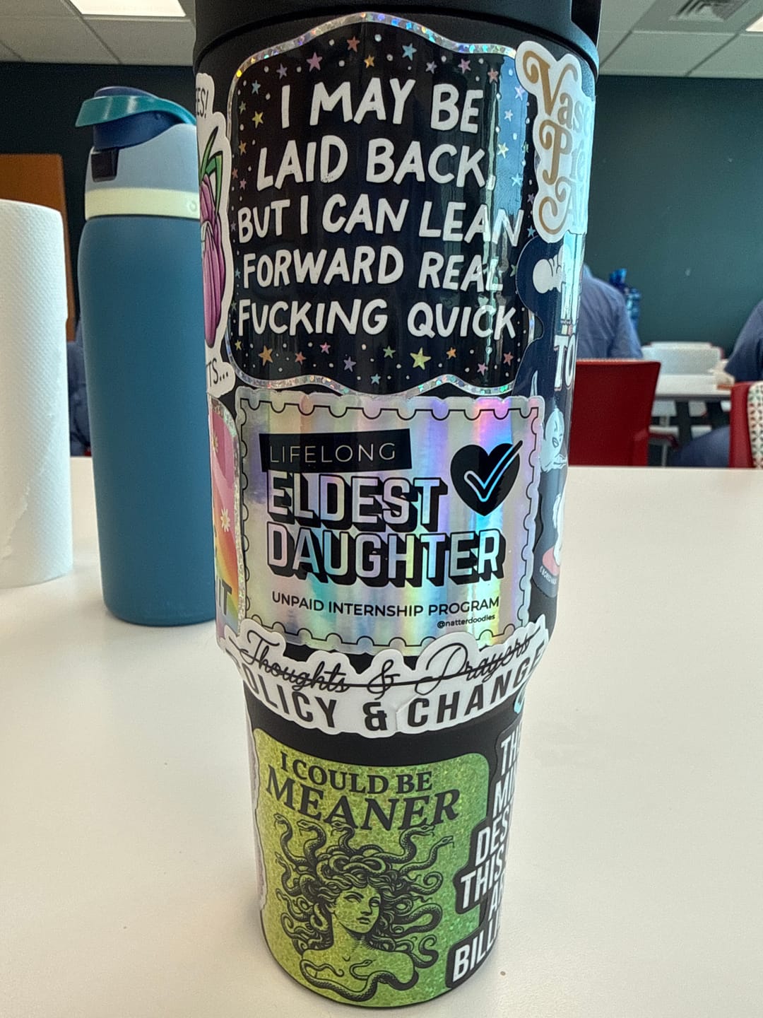 Customer photo review of I May Be Laid Back, But I Can Lean Forward Real Fucking Quick Glitter Sticker