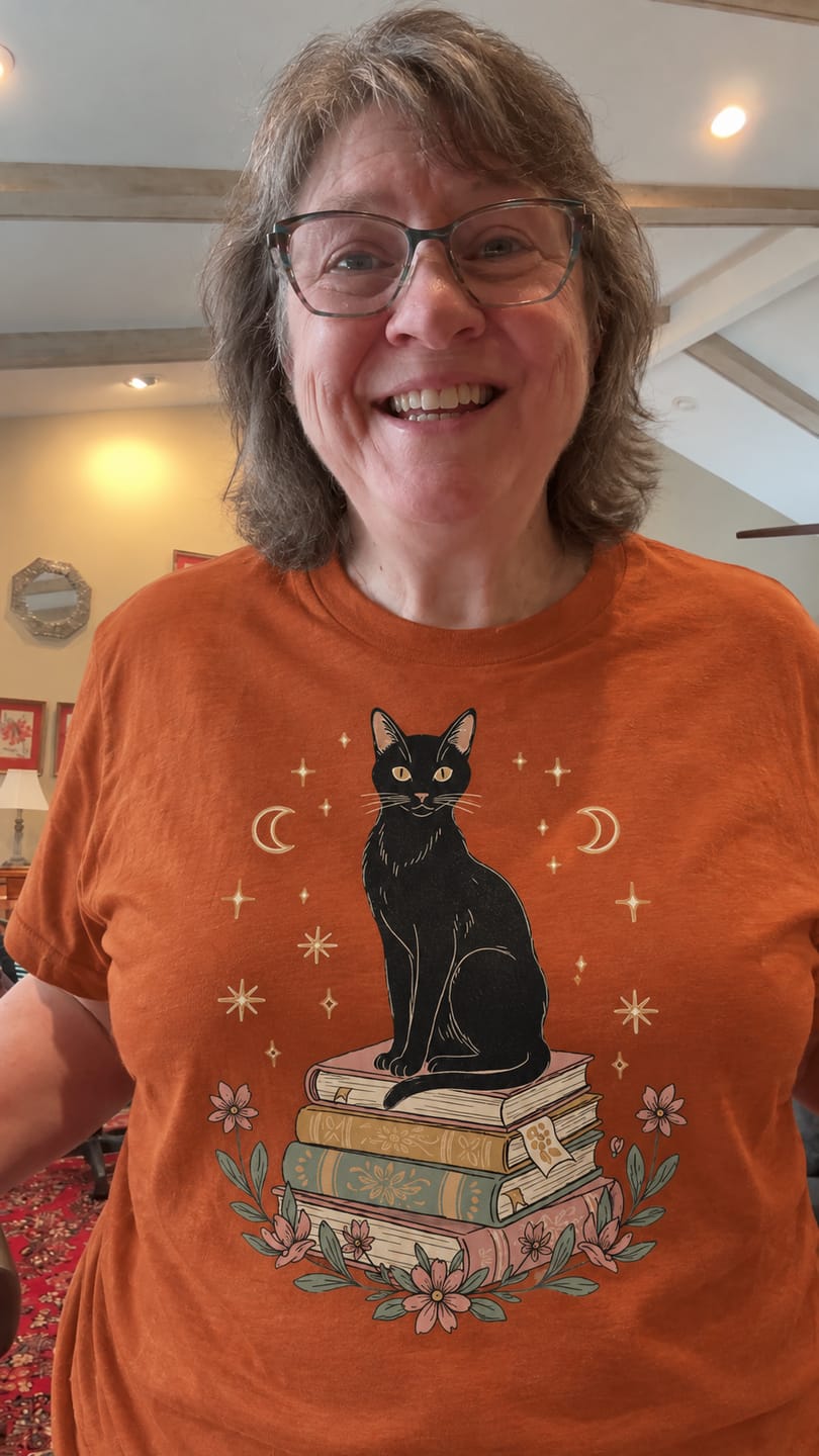 Customer photo review of Black Cat on Books T-Shirt