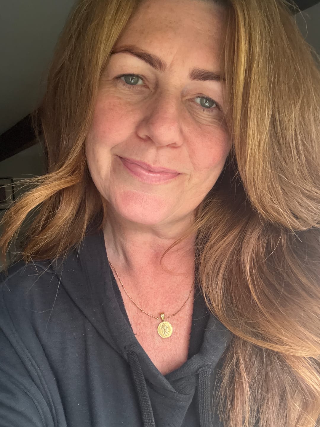 Customer photo review of St. Christopher Necklace - Stay Safe Wherever You Go