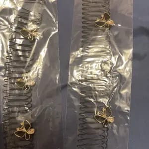 Customer photo review of Fissaggio Capelli U Shape Set 3 Pezzi Pinza Elasticizzata Nera