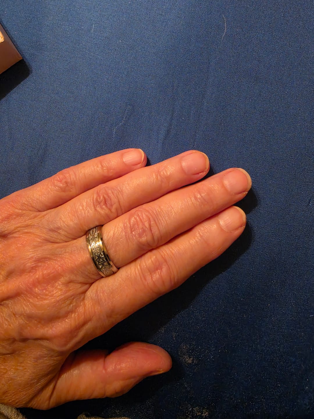 Customer photo review of Christianartworkshop Rustic Stainless Steel Ring: "Jesus" in Fish