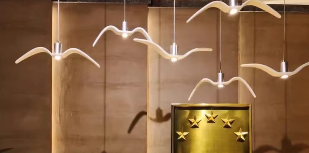 Customer photo review of Resin Bird Pendant Light, White or Black, 32 to 40 cm