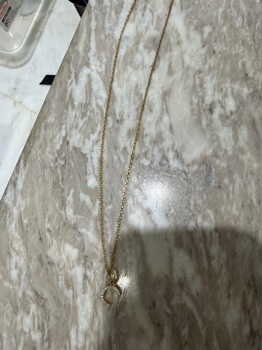 Customer photo review of Collar Plateado Inicial Con Zirconias