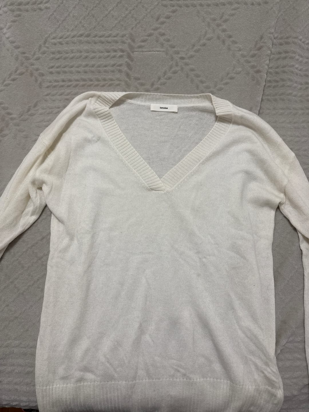 Customer photo review of IAMXIAA Relaxed V-Neck Knit Sweater