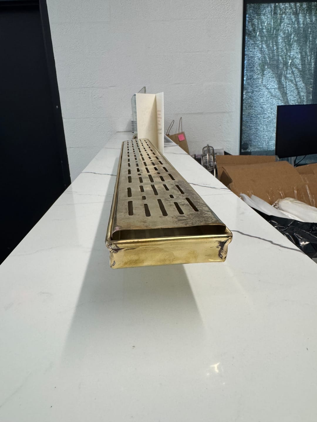 Customer photo review of Unlacquered Brass Floor Drain