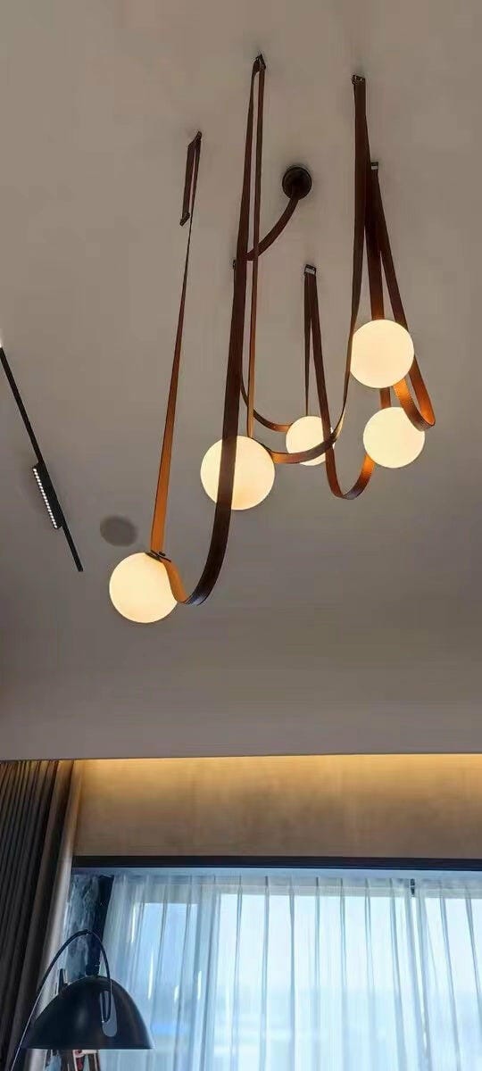 Customer photo review of Multiple Belt Art Pendant Light, Leather or Canvas Glass Globe Chandelier