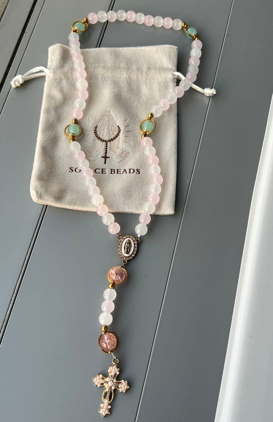 Customer photo review of SolaceBeads Artistic Pink & White Beaded Rosary: A Fusion of Colors & Sacred Symbols