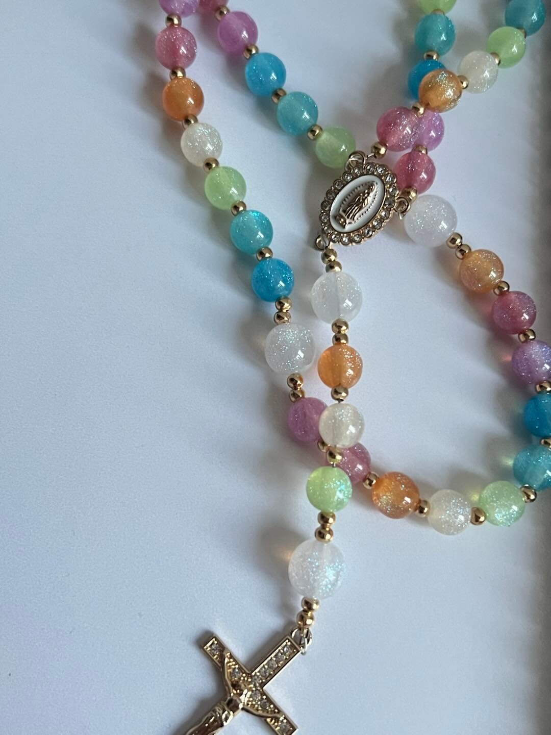 Customer photo review of Solacebeads Rainbow Cat Eye Artistic Rosary With Rhinestone Crucifix: The Timeless Devout Faith