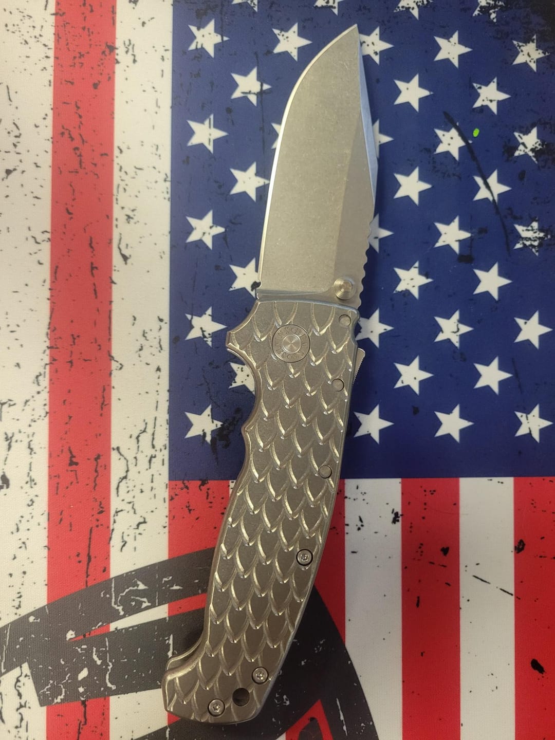 Customer photo review of Demko AD20 XXX - 4" CPM-3V Clip Point, Dragon Scale Titanium, Shark-Lock - Made in USA (DEMKO-AD20XXX-DSTI)