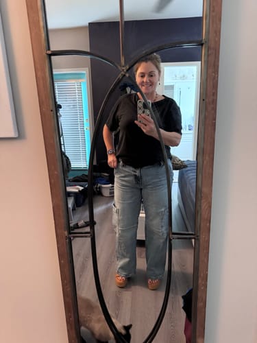 Reviewer in a mirror wearing Kancan Baggy Cargo Jean with utility-inspired pockets.