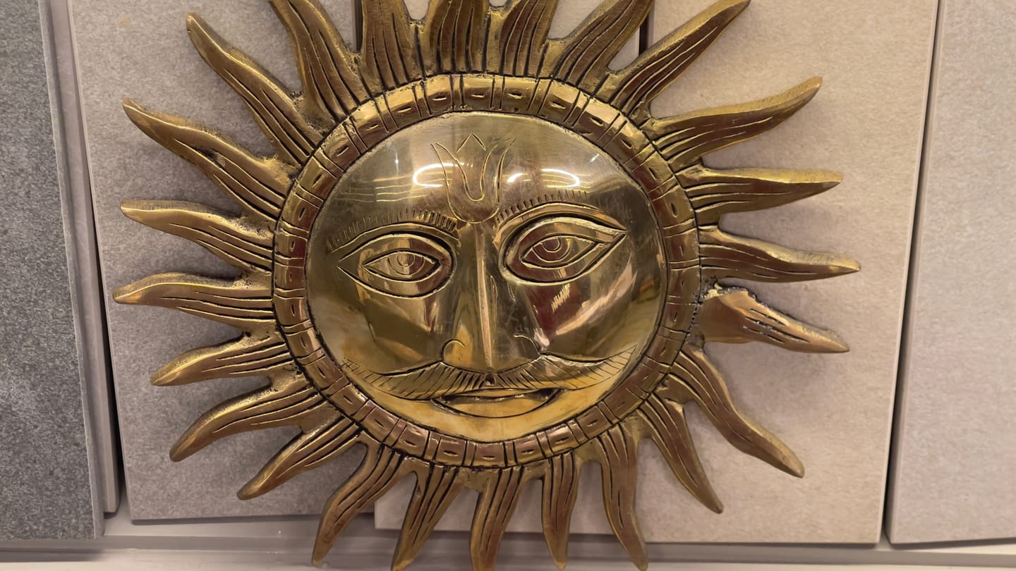 Customer photo review of Brass Surya (Sun) Ji Wall Hanging Idol Vastu Remedy for East Direction Balance, Fame and Positive Energy | 24 X 24 cm | 1 kg