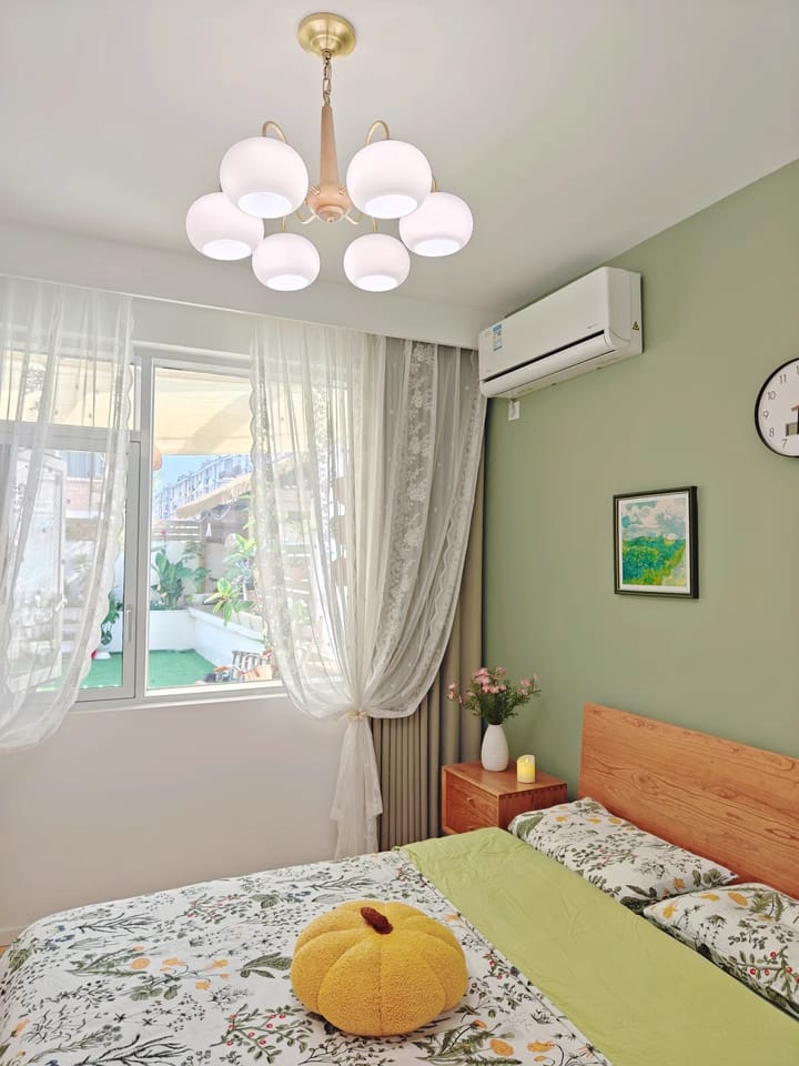 Customer photo review of Walnut Chandelier, Cream Glass Shades on Brass Arms, 3 to 6 Lights