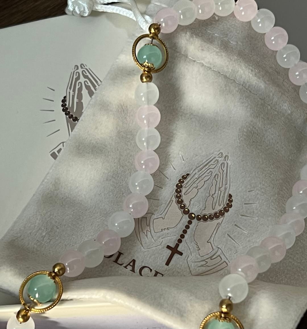 Customer photo review of SolaceBeads Artistic Pink & White Beaded Rosary: A Fusion of Colors & Sacred Symbols