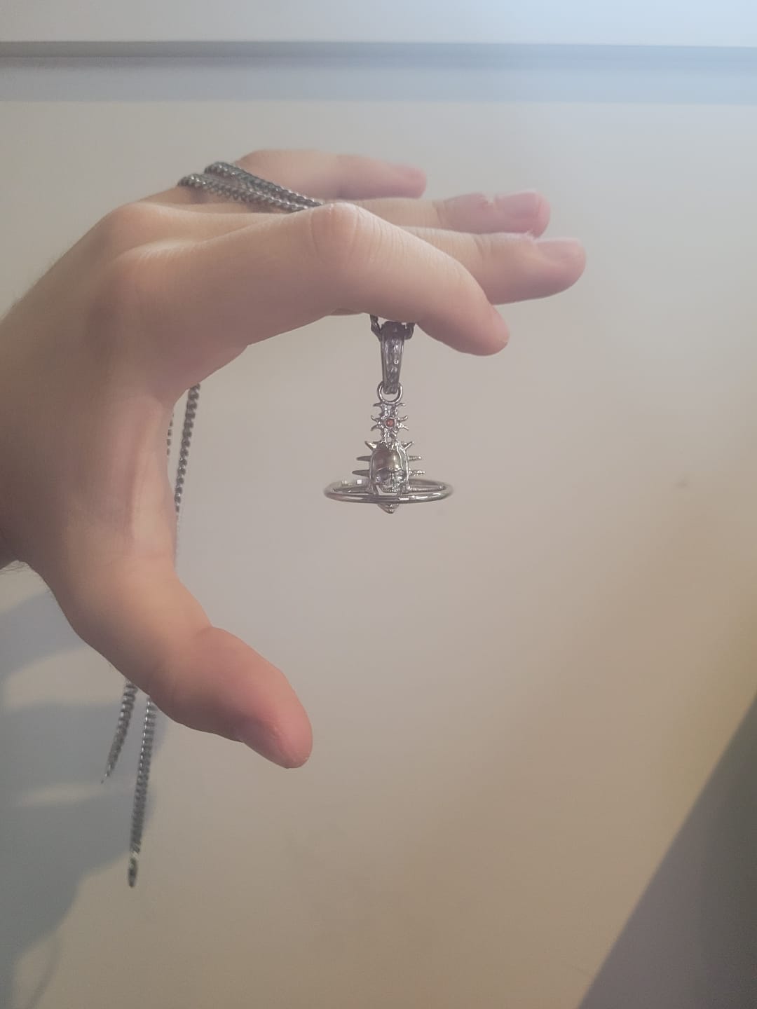 Customer photo review of ORBITUARY PENDANT