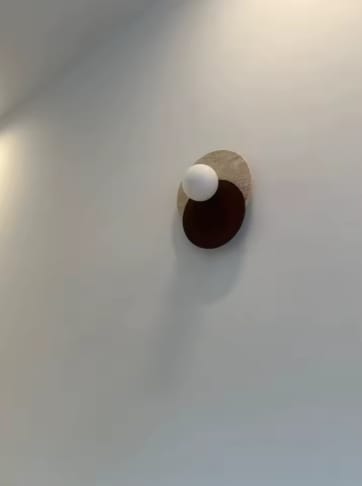 Customer photo review of Luna | Travertine Wall Sconce
